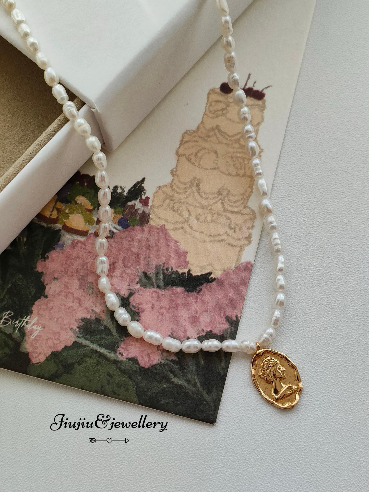 Queen's Emblem Millet Bead Necklace