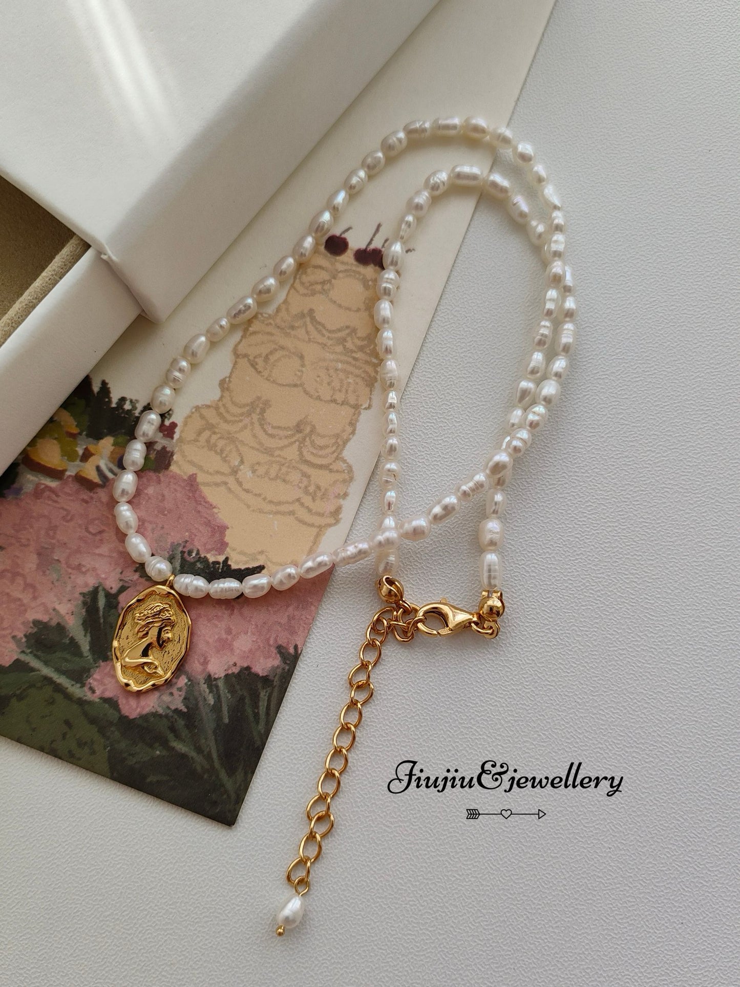 Queen's Emblem Millet Bead Necklace