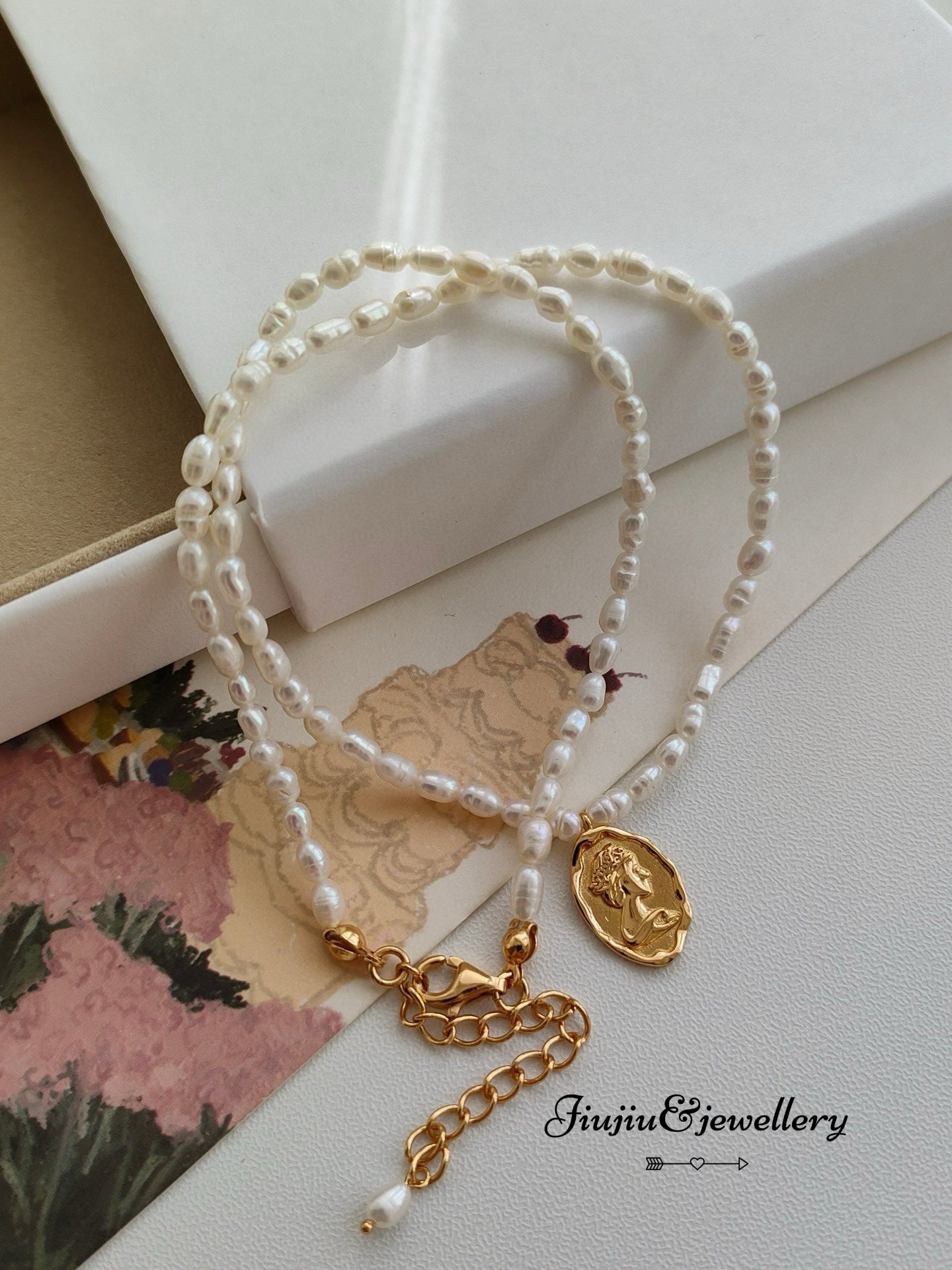 Queen's Emblem Millet Bead Necklace